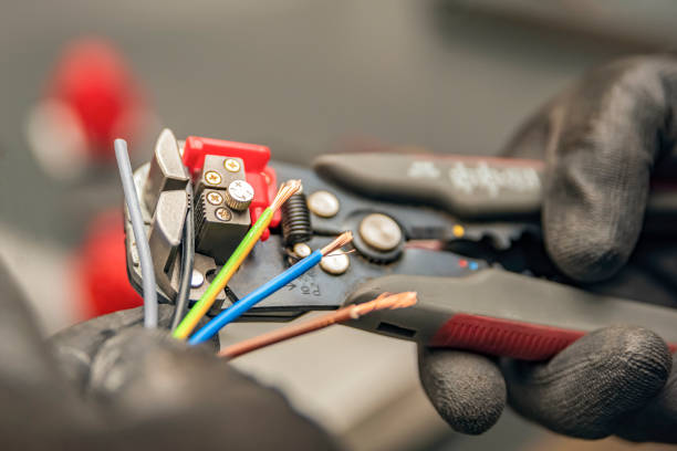 Best Electrical Contractors for Businesses  in Pella, IA